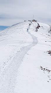 Nearing the summit on the hike to Highland Bowl. Photo courtesy aspenportriat.com